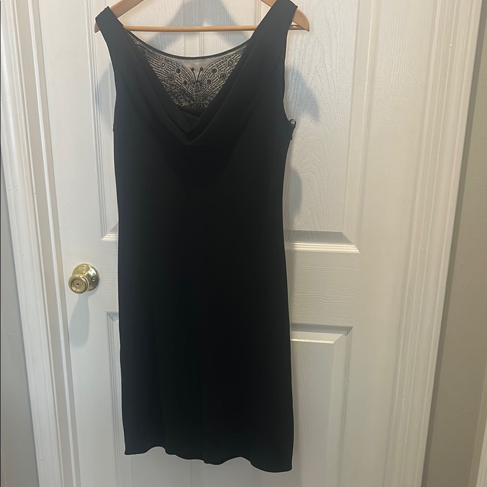 Elegant Black Sleeveless Dress with butterfly detail on the back